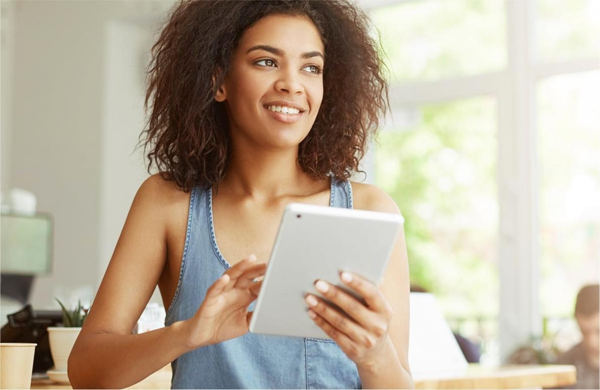 Financial modeling workspace with analytical tools and frameworks displayed on multiple screens